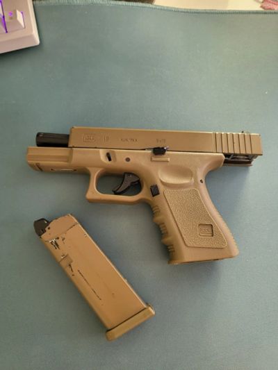 Лот: 21075327. Фото: 1. Страйкбольный пистолет Glock 19... Пейнтбол, страйкбол