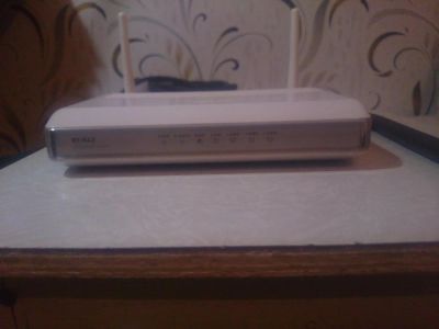 Лот: 6163844. Фото: 1. Wi-Fi роутер ASUS RT-N12. Маршрутизаторы (роутеры)