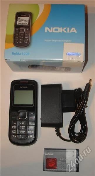 Лот: 1408060. Фото: 1. Nokia 1202 В идеальном состоянии... Кнопочные мобильные телефоны