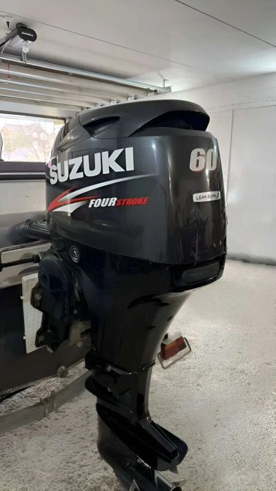 Лот: 25362798. Фото: 1. 4х-тактный лодочный мотор SUZUKI... Лодочные моторы
