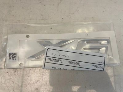 Лот: 24627559. Фото: 1. эмблема BMW X6 G06. Двигатель и элементы двигателя