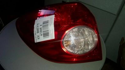 Лот: 4451275. Фото: 1. Фара (Стоп сигнал) левая. Nissan... Оптика и освещение