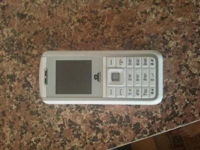 Лот: 7697996. Фото: 1. CDMA Skylink Hisense белый. Кнопочные мобильные телефоны