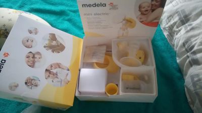 Лот: 7616421. Фото: 1. Молокоотсос электрический medela. Другое (дети растут)