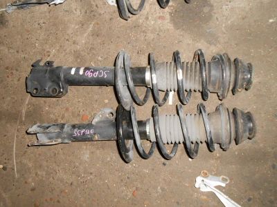 Лот: 20895867. Фото: 1. Стойка подвески Toyota Vitz SCP90... Ходовая, подвеска, рулевое управление