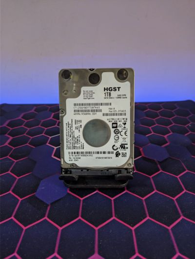 Лот: 25397265. Фото: 1. Жесткий диск 1Tb/2.5"/5400/HGST... Жёсткие диски (HDD)