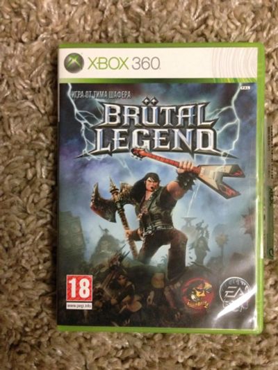 Лот: 6713751. Фото: 1. Brutal Legend Xbox 360. Игры для консолей