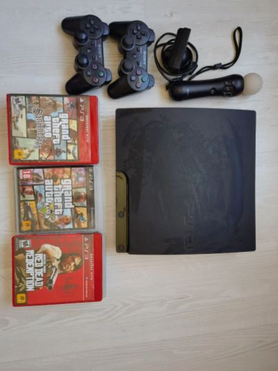 Лот: 20684887. Фото: 1. ps3 slim прошитая +8 игр. Игровые приставки, консоли