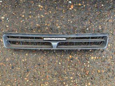 Лот: 16657642. Фото: 1. Решетка радиатора Toyota Carina... Кузов