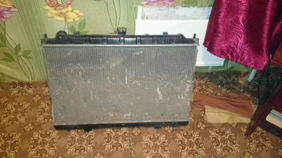 Лот: 4566671. Фото: 1. Радиатор Nissan Avenir, Tino... Двигатель и элементы двигателя