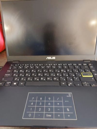 Лот: 20330709. Фото: 1. Ноутбук Asus E410M в использовании... Ноутбуки