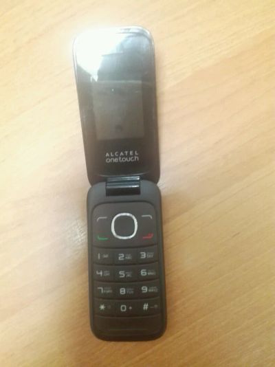 Лот: 12261436. Фото: 1. Сотовый Alcatel 1035D (4627). Кнопочные мобильные телефоны