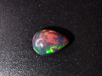Лот: 20940559. Фото: 1. 0,81 ct. Опал груша (Эфиопия... Драгоценные и поделочные камни