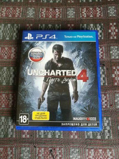 Лот: 11812097. Фото: 1. Игра Uncharted 4 PS4. Игры для консолей