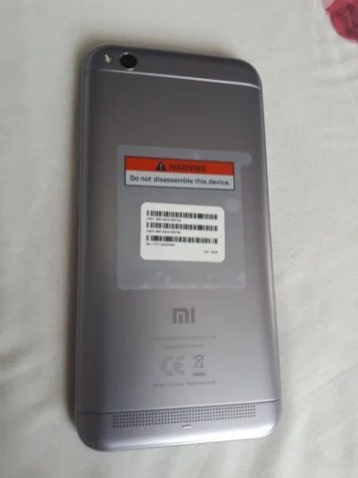 Лот: 10898848. Фото: 1. Новый Xiaomi redmi 5a в сером... Смартфоны