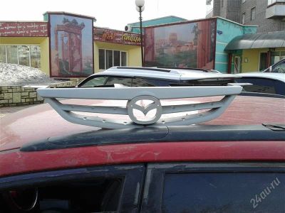 Лот: 2730127. Фото: 1. решетка Mazda Familia/Фамилия... Кузов