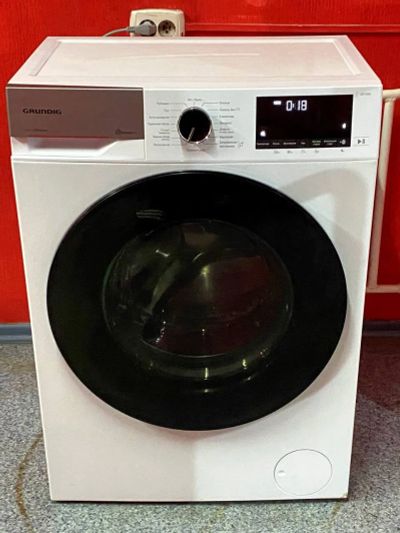 Лот: 21356442. Фото: 1. Стиральная машина узкая Grundig... Стиральные машины