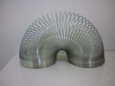 Лот: 1145815. Фото: 1. Пружинка "Slinky" метал. Фигурки, статуэтки