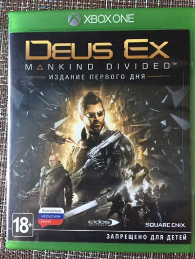 Лот: 14788856. Фото: 1. Deus Ex Mankind Divided xbox one. Игры для консолей