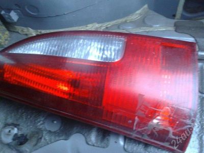 Лот: 338103. Фото: 1. Фонарь задний Mazda Premacy. Оптика и освещение