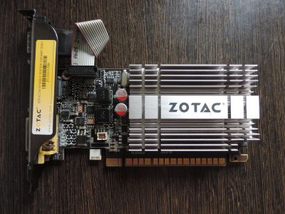 Лот: 11308597. Фото: 1. Видеокарта zotac geforce 210 1gb... Видеокарты