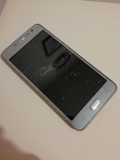 Лот: 12699337. Фото: 1. Samsung G532 Galaxy J2 Prime Silver. Смартфоны