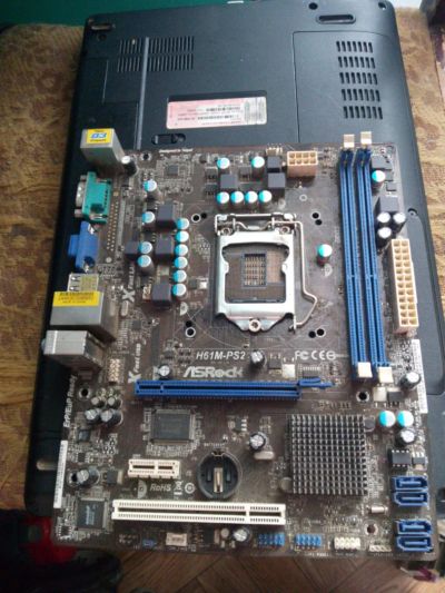 Лот: 9606640. Фото: 1. Материнская плата AsRock H61M-PS2... Материнские платы