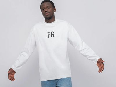 Лот: 20416923. Фото: 1. Свитшот FEAR OF GOD Essentials. Свитеры, толстовки, худи