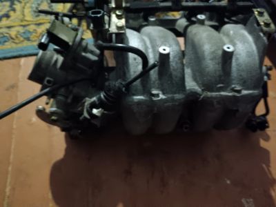 Лот: 24615541. Фото: 1. Дроссельная заслонка mazda capella. Двигатель и элементы двигателя