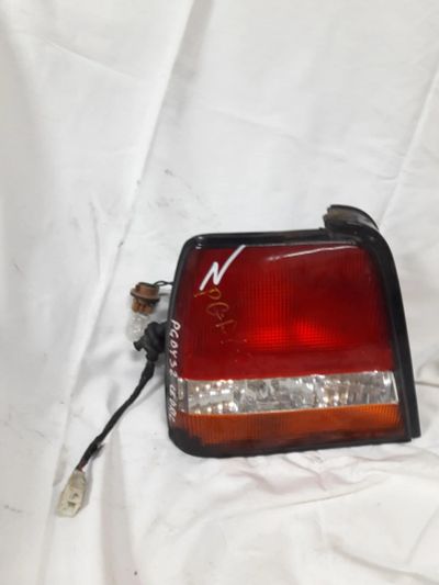 Лот: 10047882. Фото: 1. Задний фонарь для Nissan Cedric. Оптика и освещение