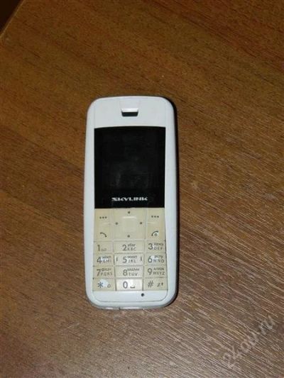 Лот: 2010459. Фото: 1. CDMA Р/телефон Simple белый. Кнопочные мобильные телефоны