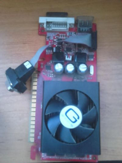 Лот: 6853461. Фото: 1. видеокарта GT520 1024M DDR3 64B. Видеокарты