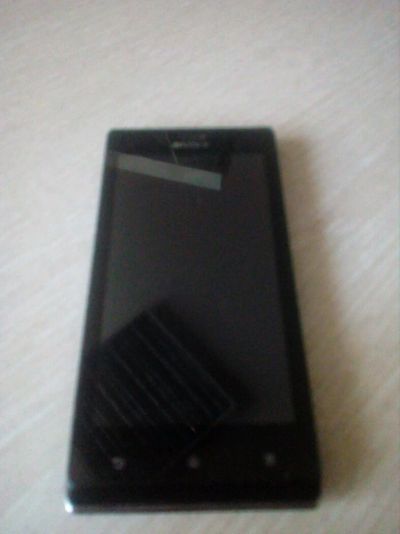 Лот: 13949868. Фото: 1. Смартфон Sony ST26i не включается... Смартфоны