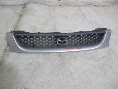 Лот: 15527619. Фото: 1. Решетка радиатора Mazda Capella... Кузов