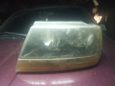 Лот: 19634442. Фото: 1. фара левая Jeep Grand Cherokee. Оптика и освещение
