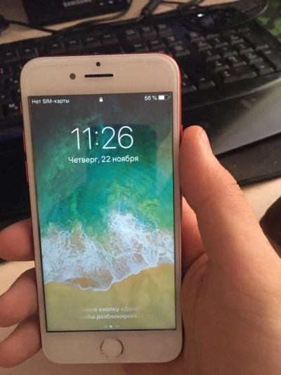 Лот: 12669636. Фото: 1. iPhone 7 Red 128 GB. Смартфоны