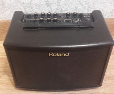 Лот: 16053922. Фото: 1. Комбоусилитель Roland ac-33. Гитарные эффекты и комбоусилители