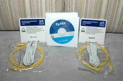 Лот: 1359980. Фото: 1. powerline-адаптеры ZyXEL PLA400... WiFi, Bluetooth адаптеры
