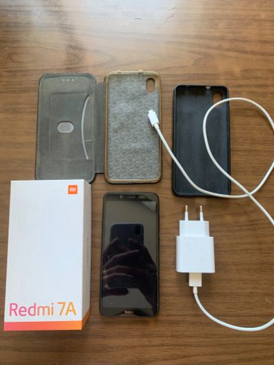 Лот: 17996683. Фото: 1. Идеальный Redmi 7A с защитным... Смартфоны