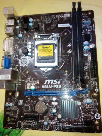 Лот: 13010754. Фото: 1. MSI-H81M-P33 (Повреждён сокет). Материнские платы