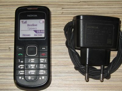 Лот: 4458801. Фото: 1. сотовый Nokia 1202 + фонарь (9... Кнопочные мобильные телефоны