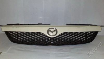 Лот: 472802. Фото: 1. Решетка радиатора Mazda. Кузов