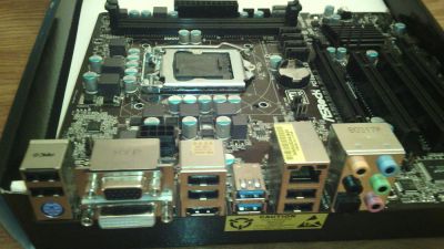Лот: 5316970. Фото: 1. ASRock Z77M. Материнские платы