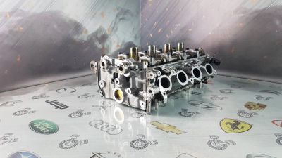 Лот: 23585209. Фото: 1. Головка блока цилиндров Mitsubishi... Двигатель и элементы двигателя