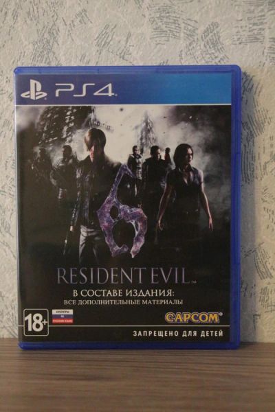 Лот: 9705649. Фото: 1. Resident Evil 6 (PS4) + доп. материалы. Игры для консолей