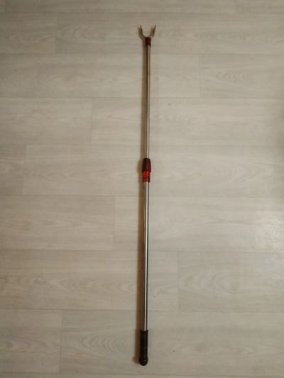 Лот: 19583919. Фото: 1. Палка для снятия одежды. Сумки