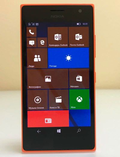 Лот: 10802597. Фото: 1. Смартфон Nokia Lumia 735 (оранжевый... Смартфоны