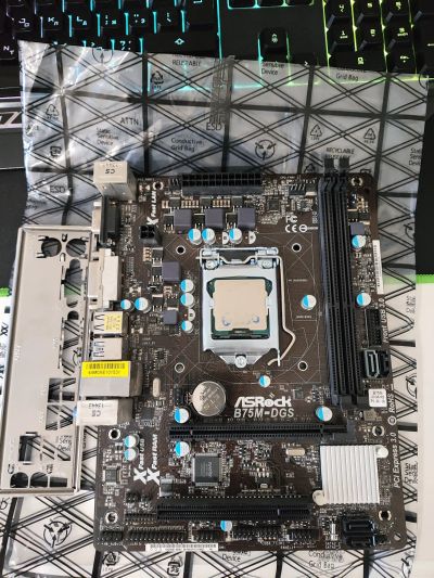 Лот: 25203896. Фото: 1. Asrock B75M-DGS. Материнские платы