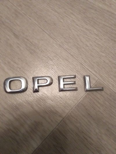 Лот: 12577765. Фото: 1. Шильдик Opel. Детали тюнинга