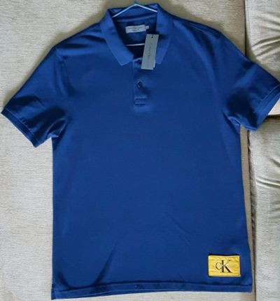 Лот: 12536046. Фото: 1. Поло Calvin Klein. Футболки, поло